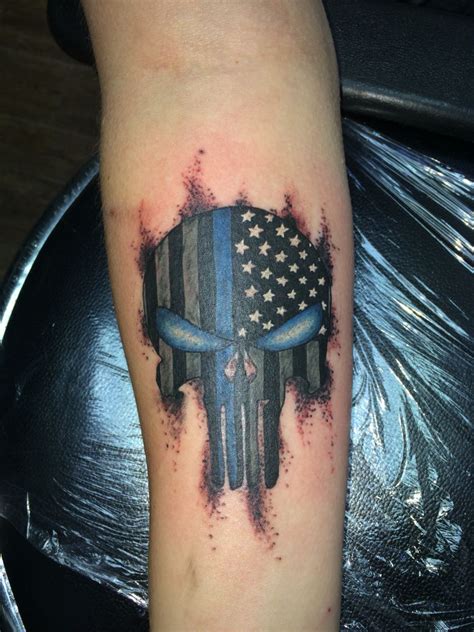 Law enforcement punisher skull Tattoo done by Ricky Garza in victoria ...