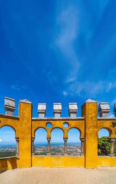 Premium Photo | Moorish arches of the arched courtyard with the yellow painted walls of the Pena ...