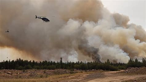 N.W.T., Yellowknife upping protection as city is surrounded by wildfires | CBC News