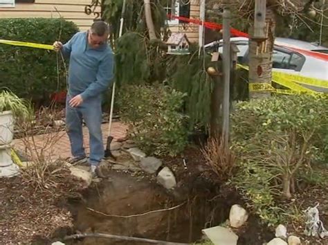 Three Saved from Terrifying Sinkhole Collapse