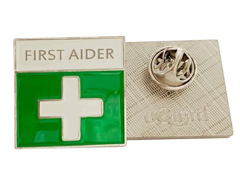 Oqard First Aider Badge - Pack of 1: Amazon.co.uk: Business, Industry & Science