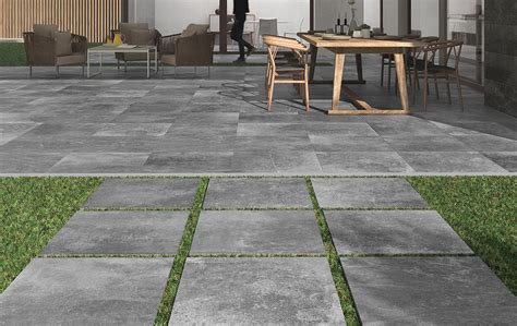 Kainos 90x90. Large format natural stone look porcelain tiles.