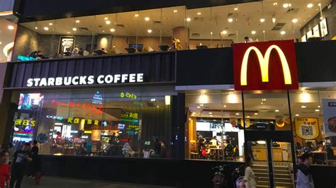 TikTok Can't Get Enough Of This McDonald's Vs. Starbucks Sign War