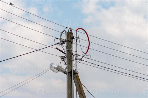 electric pole with wires against blue sky 9981110 Stock Photo at Vecteezy