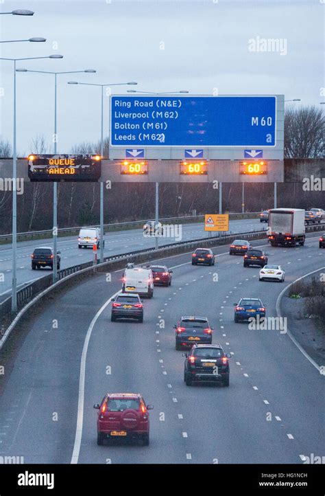 Busy traffic on the M60 motorway in Manchester near Sale Stock Photo - Alamy