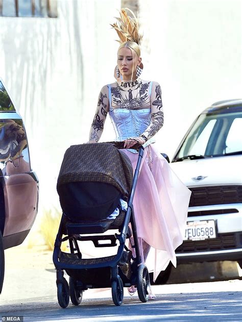 EXCLUSIVE: Iggy Azalea pushes baby Onyx in a Fendi stroller | Daily Mail Online