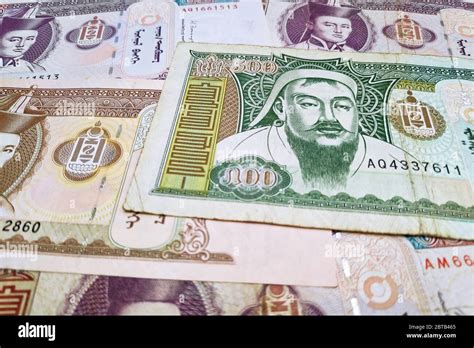 Stack of Mongolian tugrik banknotes as background Stock Photo - Alamy