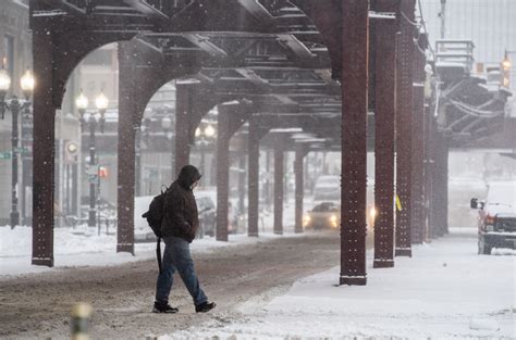 10 inches of snow and climbing in parts of Chicago area as winter storm ...