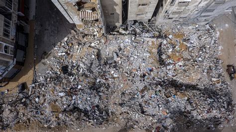 GAZA CITY, GAZA – MAY 23: A drone photo shows an aerial view of destroyed residental buildings ...