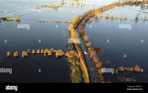 Welney, UK. 02nd Jan, 2022. The Welney wash area is beginning to fill with flood water as the ...