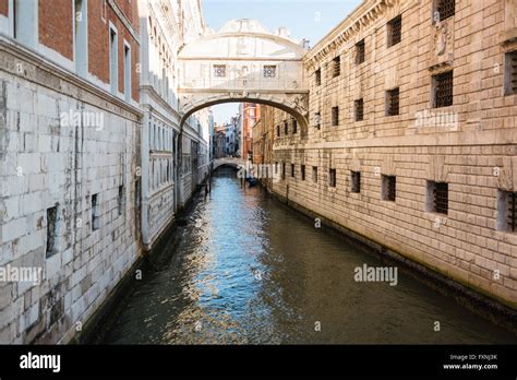 Venetian canal and bridge showing classic architecture Stock Photo - Alamy