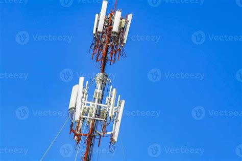 Red white 5G tower radiation in Playa del Carmen Mexico. 11900926 Stock Photo at Vecteezy