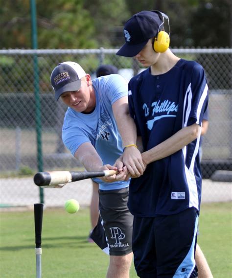 Pictures: Dr. Phillips baseball players mentor autistic students ...