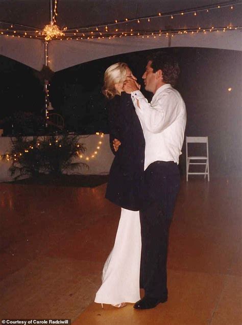 a bride and groom dance together on the dance floor at their wedding ...