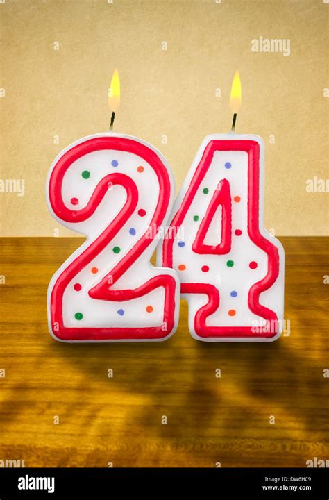 Burning birthday candles number 24 Stock Photo - Alamy