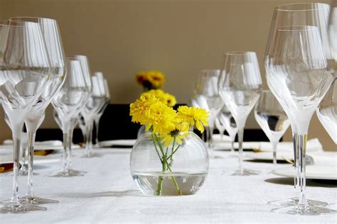 Yellow Flower in Clear Glass Vase on Table · Free Stock Photo