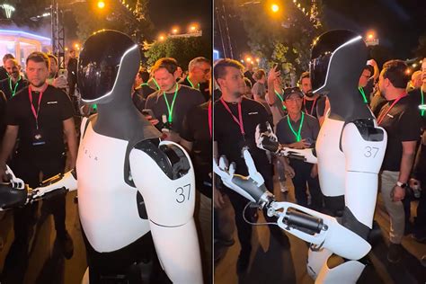 Tesla's Optimus Humanoid Robot Interacts with Guests at We, Robot Event ...