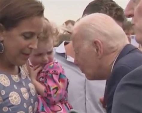 Joe Biden pretends to gobble up little girl before sniffing her in ...