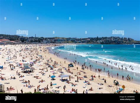 Bondi beach Sydney Australia, crowded bondi beach in summer 2023, beachgoers sunbathe and swim ...