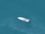 Video: Aerial footage shows capsized boat off New Zealand coast | Daily ...