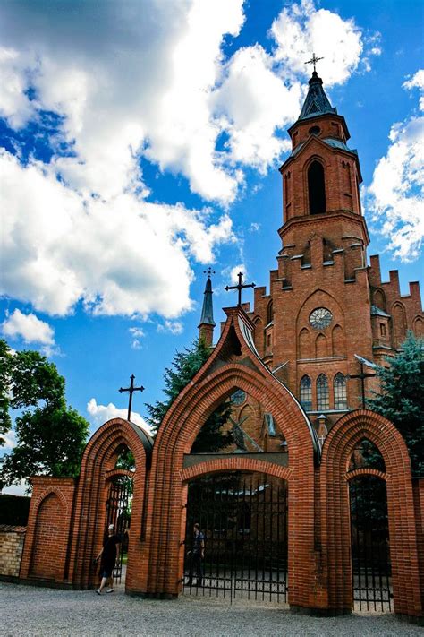 an old church with a cross on the top