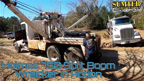 Holmes 750 Split Boom Wrecker In Action - YouTube