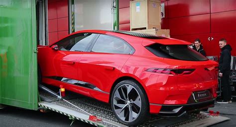 Watch the Red Jaguar I-Pace Getting Unloaded in Geneva - autoevolution