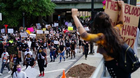 PHOTOS: Peaceful protest over death of George Floyd turns to night of ...