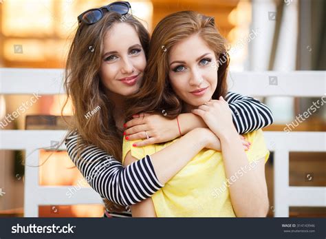 Two Friends Hugging Girls Smiling Two Stock Photo 314143946 | Shutterstock