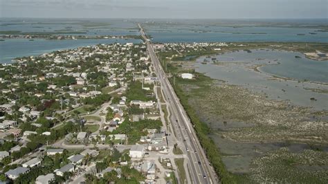 5K stock footage aerial video of flying over Overseas Highway, revealing Big Coppitt Key ...