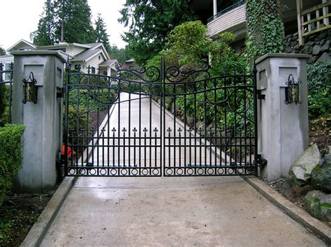 Outward swinging double swing gate with pillars. #custom #driveway #entrance #swing #gate # ...