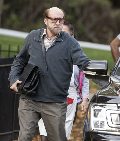 Nicolas Cage looks unrecognizable with bald head and grey beard in ...