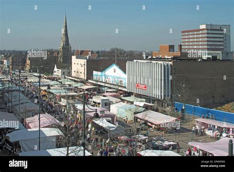 Aerial view shoppers in Romford at large outdoor retail market in urban ...