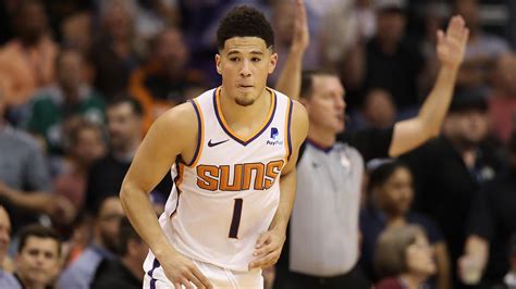 WATCH: Suns' Devin Booker Suffers Scary Ankle Injury, Carried Off Court