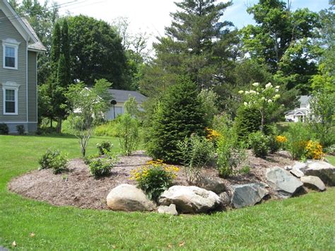 Pin by Jerrod Landress on Landscaping Front | Backyard garden layout, Landscaping berm ideas ...