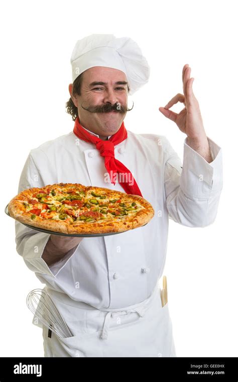 Smiling Italian chef with a pizza in hand Stock Photo - Alamy