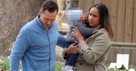 Tom Hiddleston and fiancée Zawe Ashton dote over their baby during Paris stroll - OK! Magazine