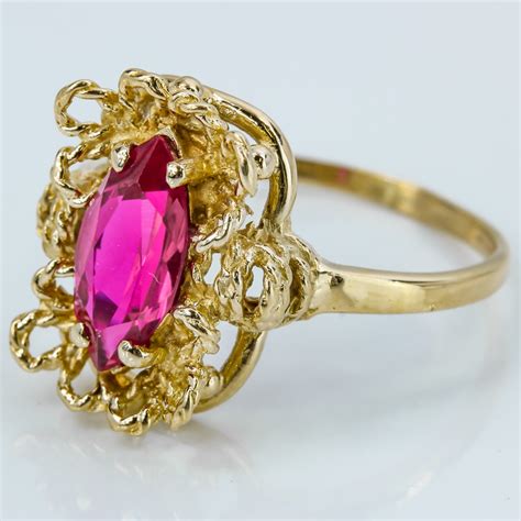 10 Karat Gold Red Stone Ring – A&V Pawn