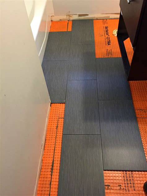 Tips for Installing a Tile Floor in a Bathroom - Semigloss Design