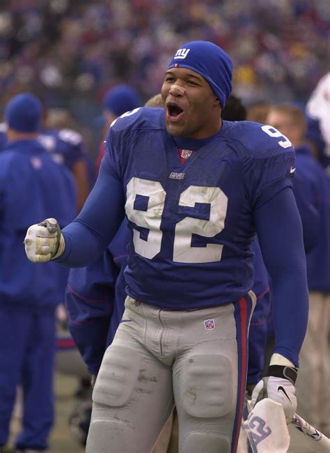 Inside Michael Strahan's rise from NFL legend to TV star as he announces career move and fans ...