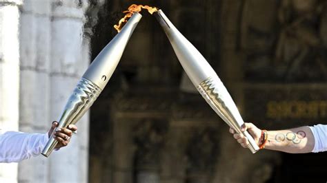 What time is the Olympic torch lighting? Opening ceremony schedule for 2024 Paris Games ...