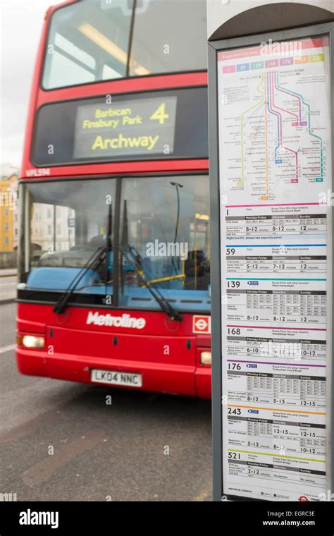 London bus stop and timetable with number 4 bus to Archway, North London, driving past, Waterloo ...