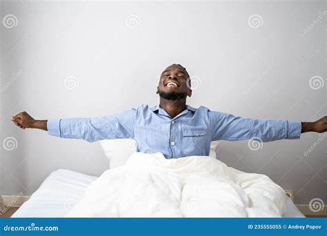 Young Happy Smiling African Man Waking Up Stock Image - Image of wakeup ...