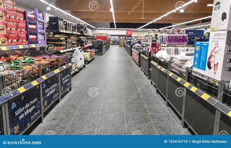 Aisle in ALDI SUED Store editorial stock image. Image of interior ...