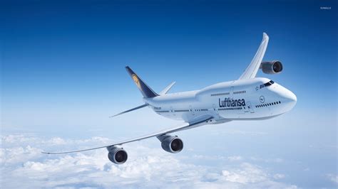 Boeing 747-8 above the fluffy clouds wallpaper - Aircraft wallpapers ...