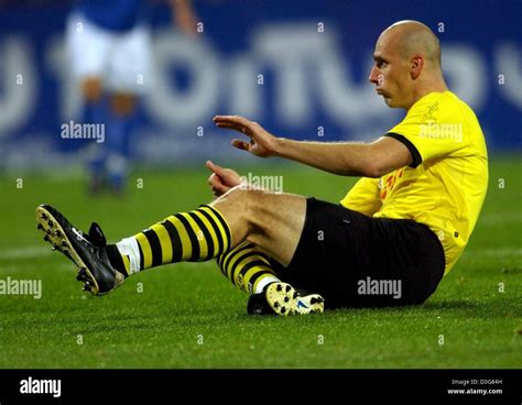 (dpa) - Dortmund's Czech forward Jan Koller sits on the pitch during ...