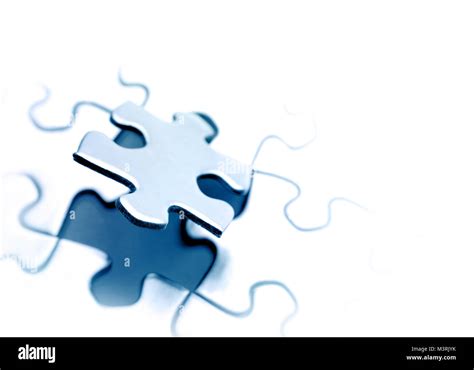 Final piece of jigsaw puzzle Stock Photo - Alamy