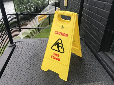 Stock photo image of a yellow 'caution wet floor' sign. | Flickr