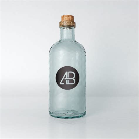 Free Realistic Glass Bottle Mockup - CreativeBooster