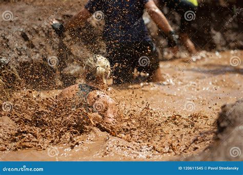 Mud race runners stock image. Image of outdoors, runner - 120611545